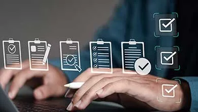 Businessman using laptop with document online for approve quality assurance and ERP management, Quality management with assurance, Quality control and improvement.