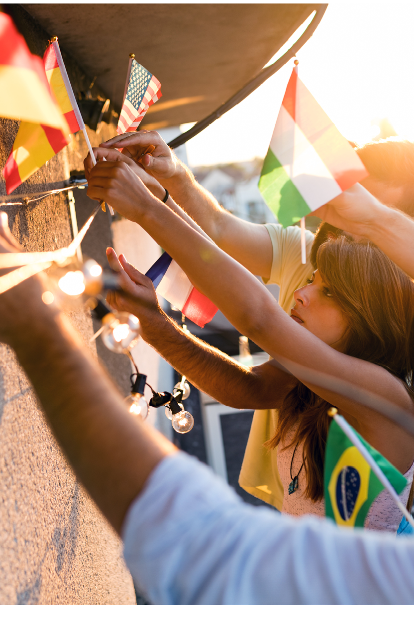 Happy young friends of younger generations and different culutres having fun, promoting peace without racial prejudices